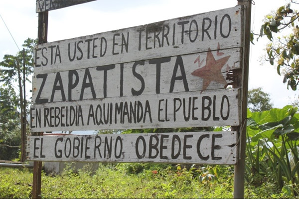 Signs such as these stand in towns along the road from San Cristobal to Palenque. "You are in Zapatista rebel territory. Here the people command and the government obeys." 